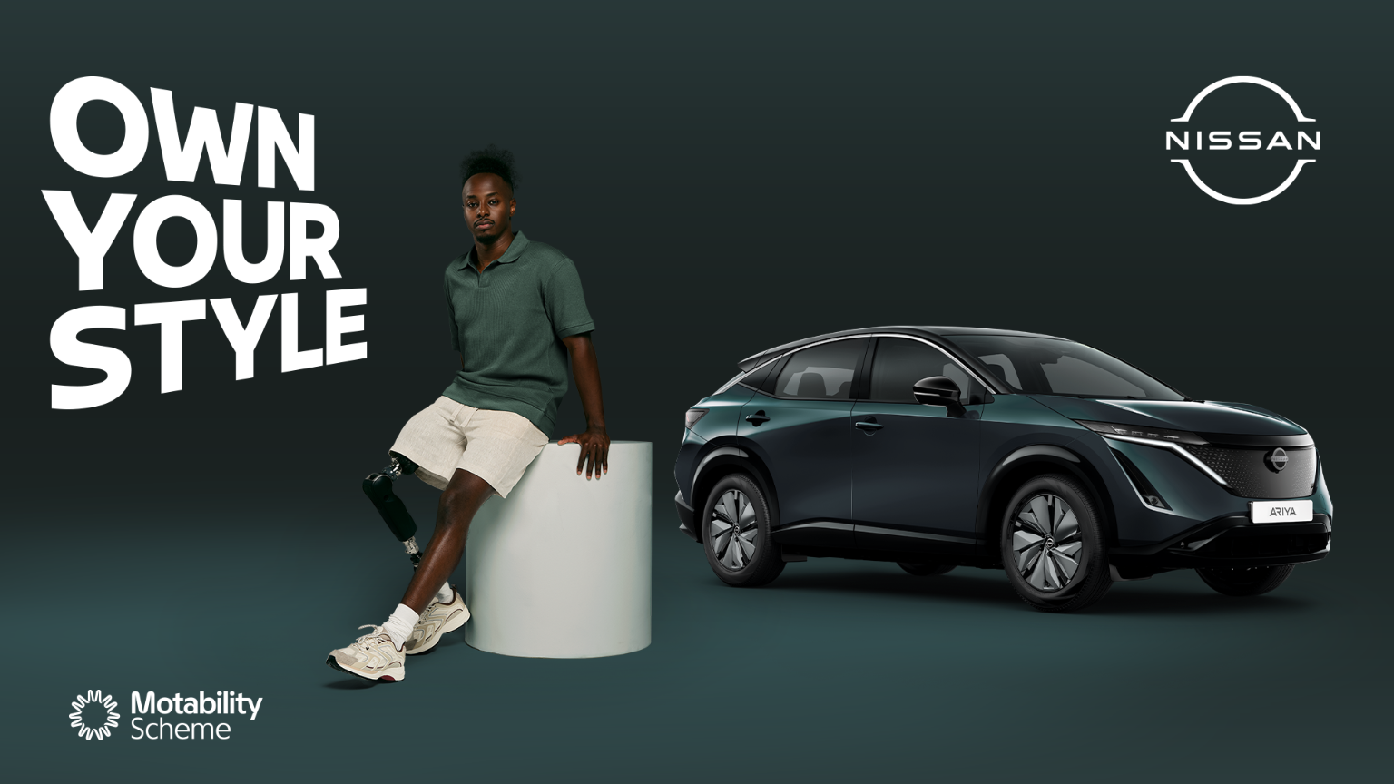 A person with a prosthetic leg sits next to a Nissan SUV, text reads Own Your Style.